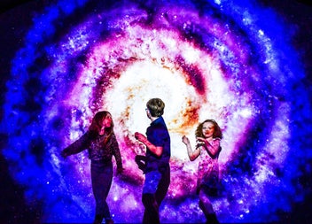 Children enjoying a light installation at EPIC