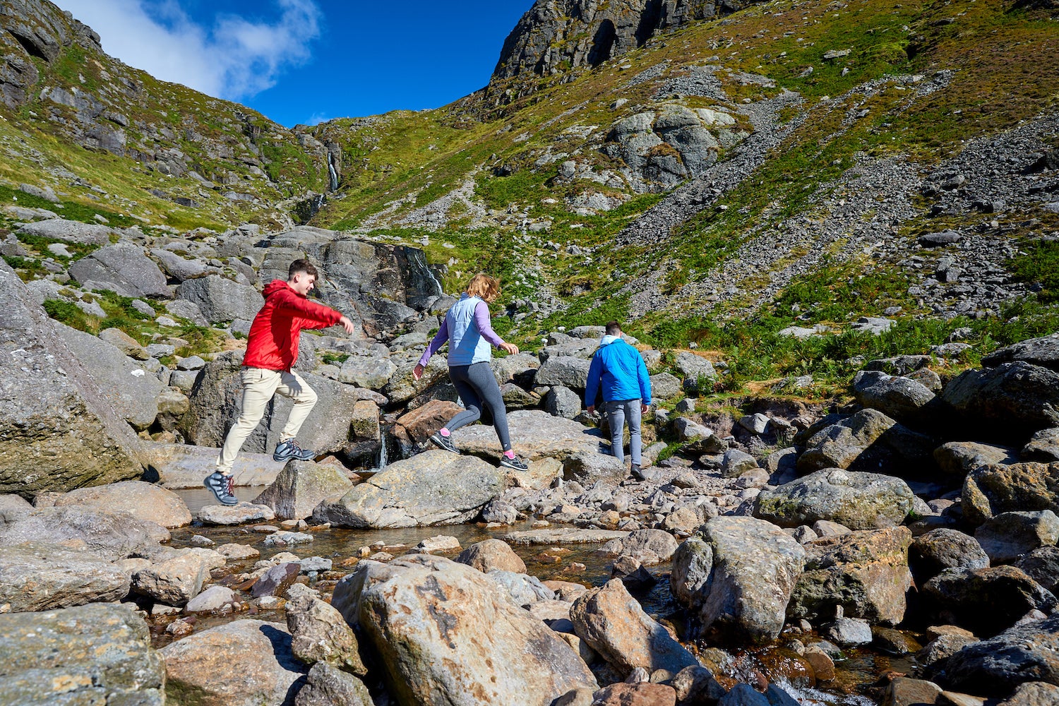 People hiking Mahon Falls in Co Waterford