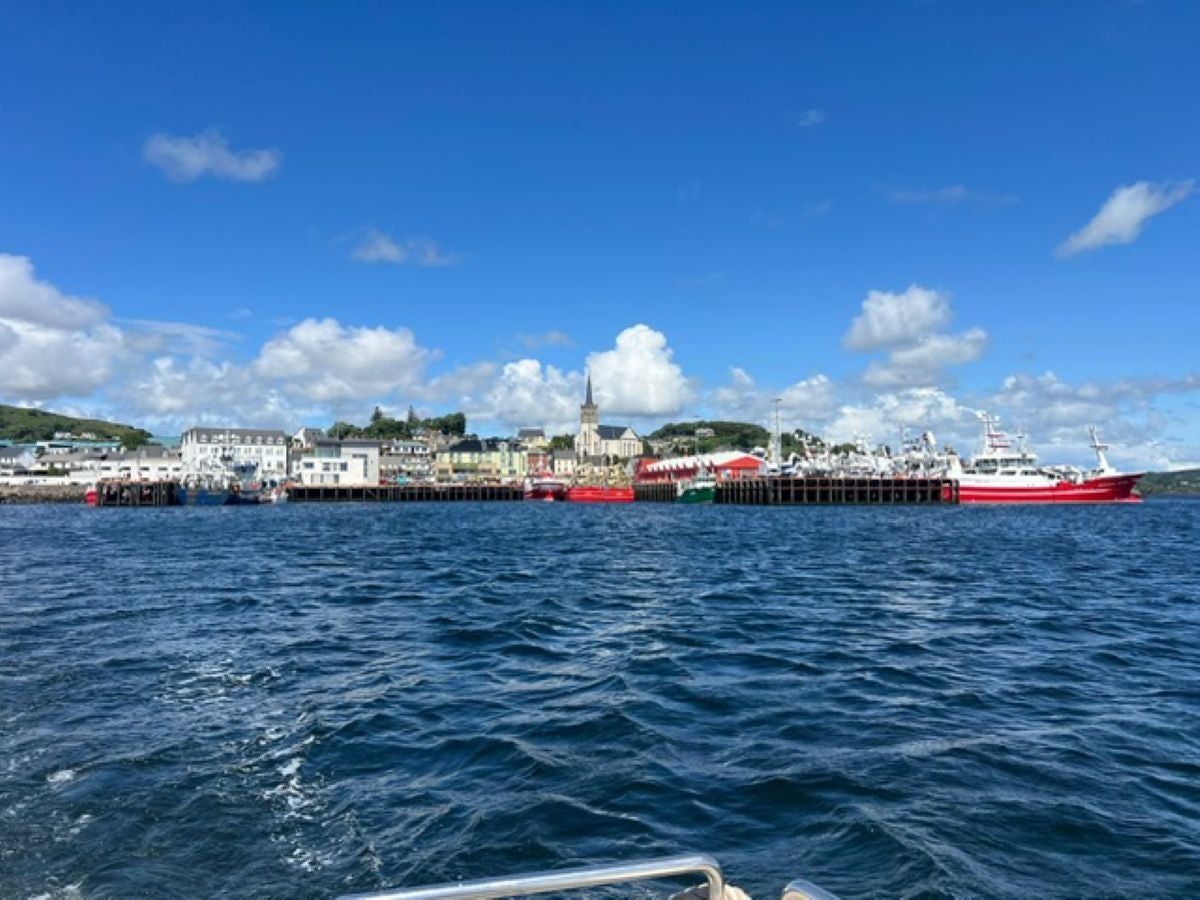 A view of a harbour town from the sea