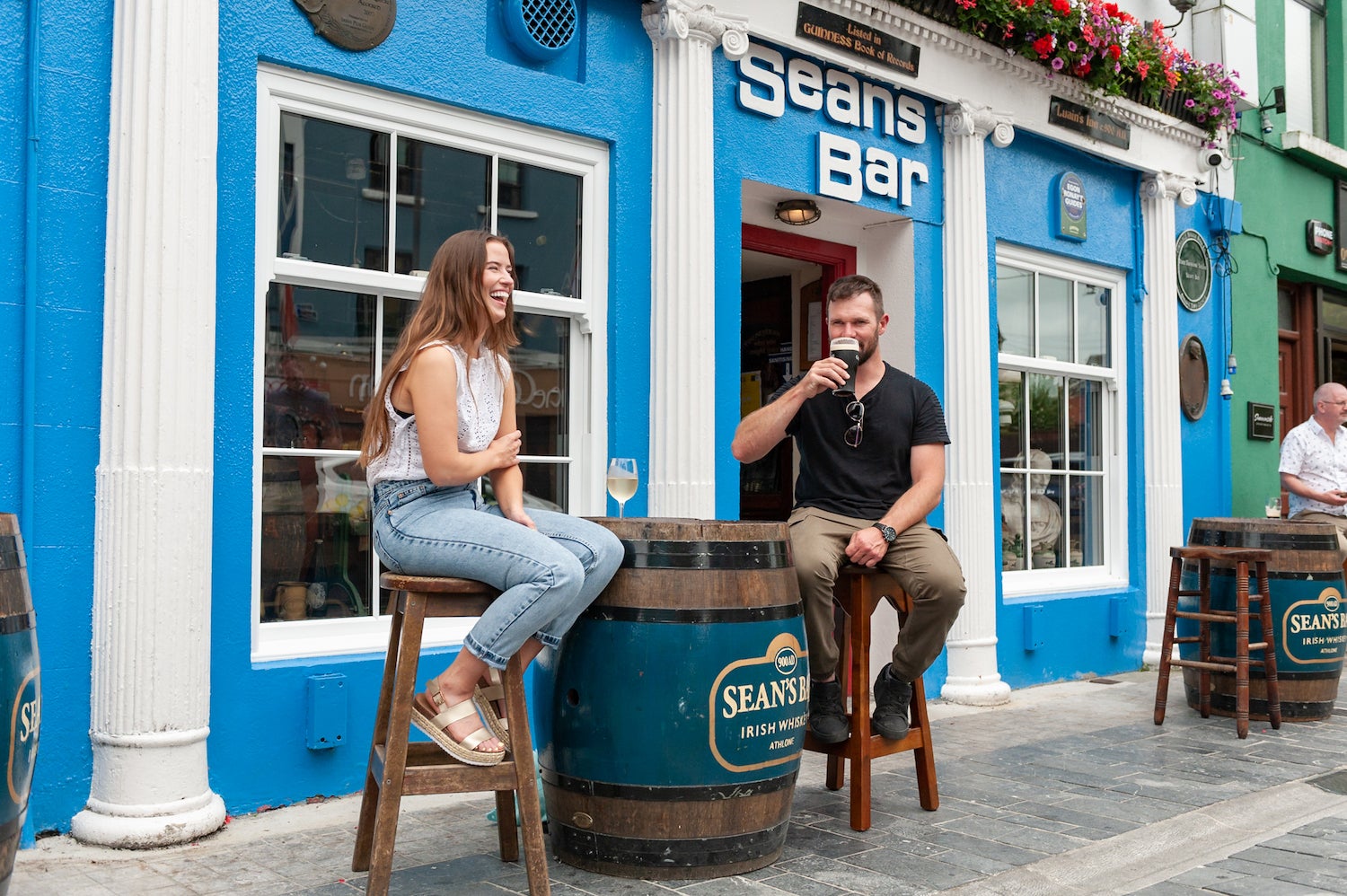 People sitting outside Sean's Bar in Athlone, Co Westmeath