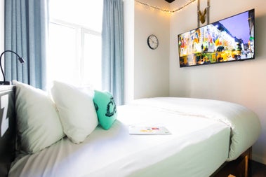 View of bedroom with TV