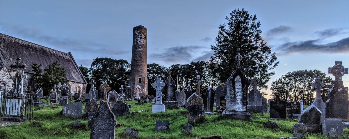 Kinneigh round tower and churchyard on a July summer's evening