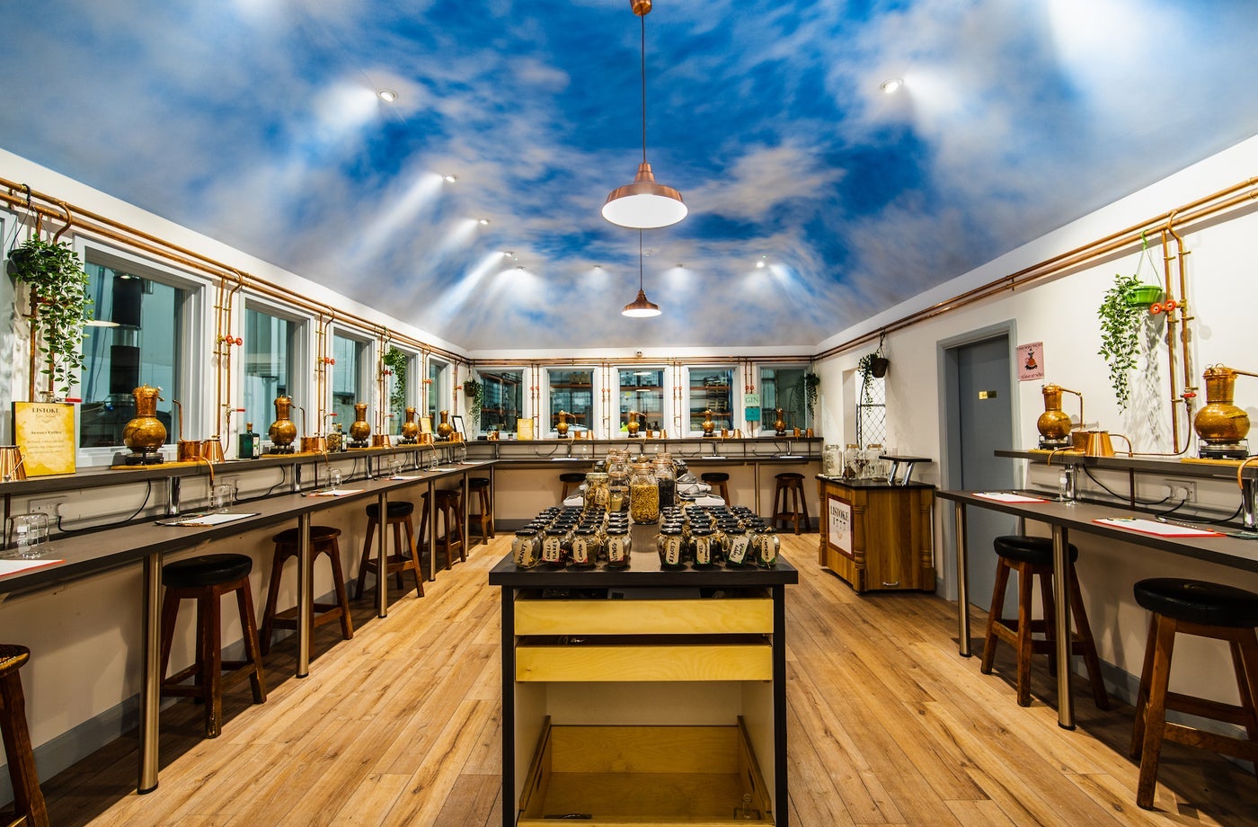 Interior of a gin school with rows of benches along the walls
