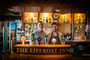 Staff behind the Bar at the Lifeboat Inn