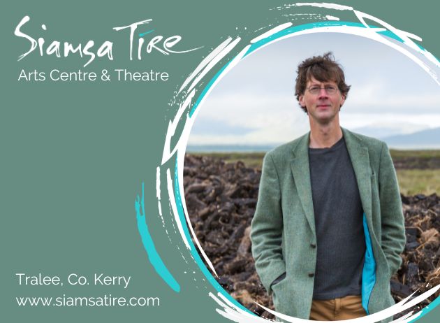 Rewilding the Mind with Manchán Magan, a man in a green jacket standing on a flat landscape with big pile of turf behind him.