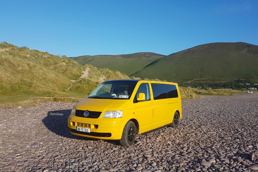 Yellow camper on beach