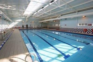 An indoor swimming pool with lane markings at Coral Leisure Arklow