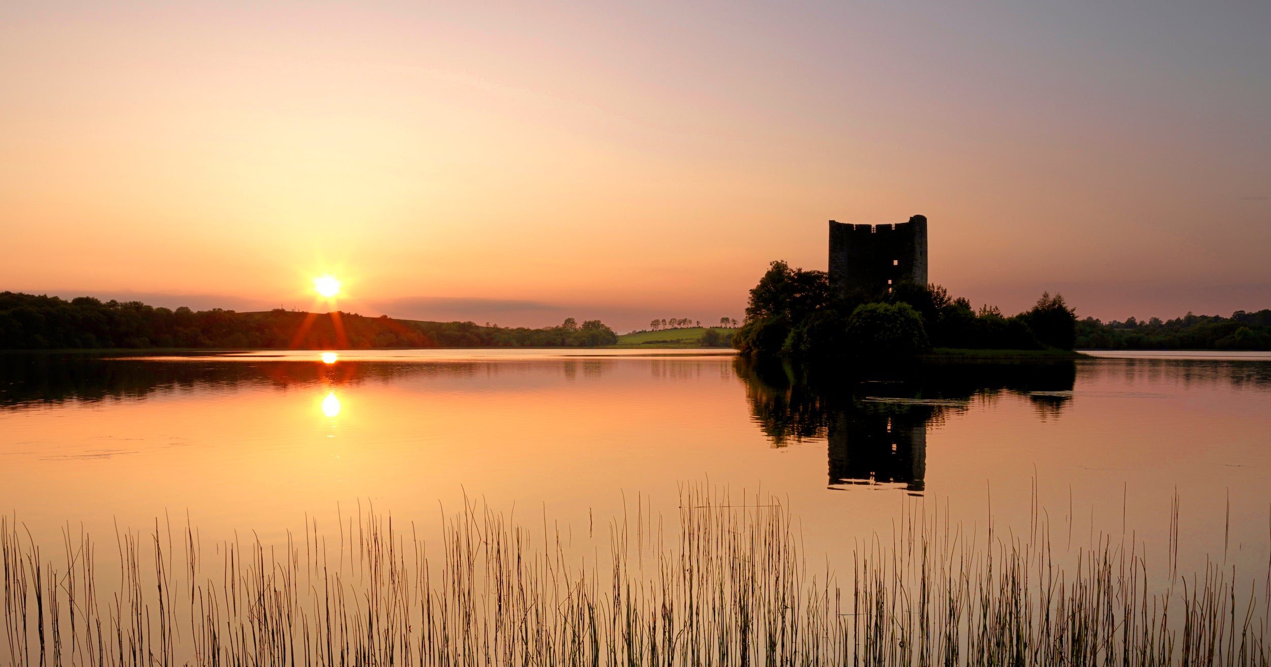 Clough Oughter Castle in County Cavan at sunset