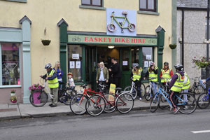Image of cyclists outside Bike Hire Shop