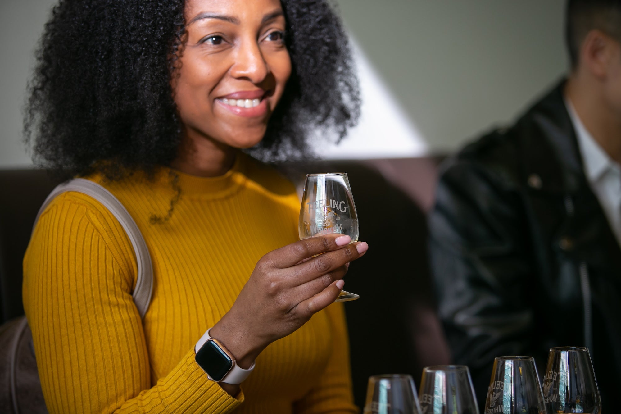 A woman on a tour of the Teeling Whiskey Distillery in Dublin city