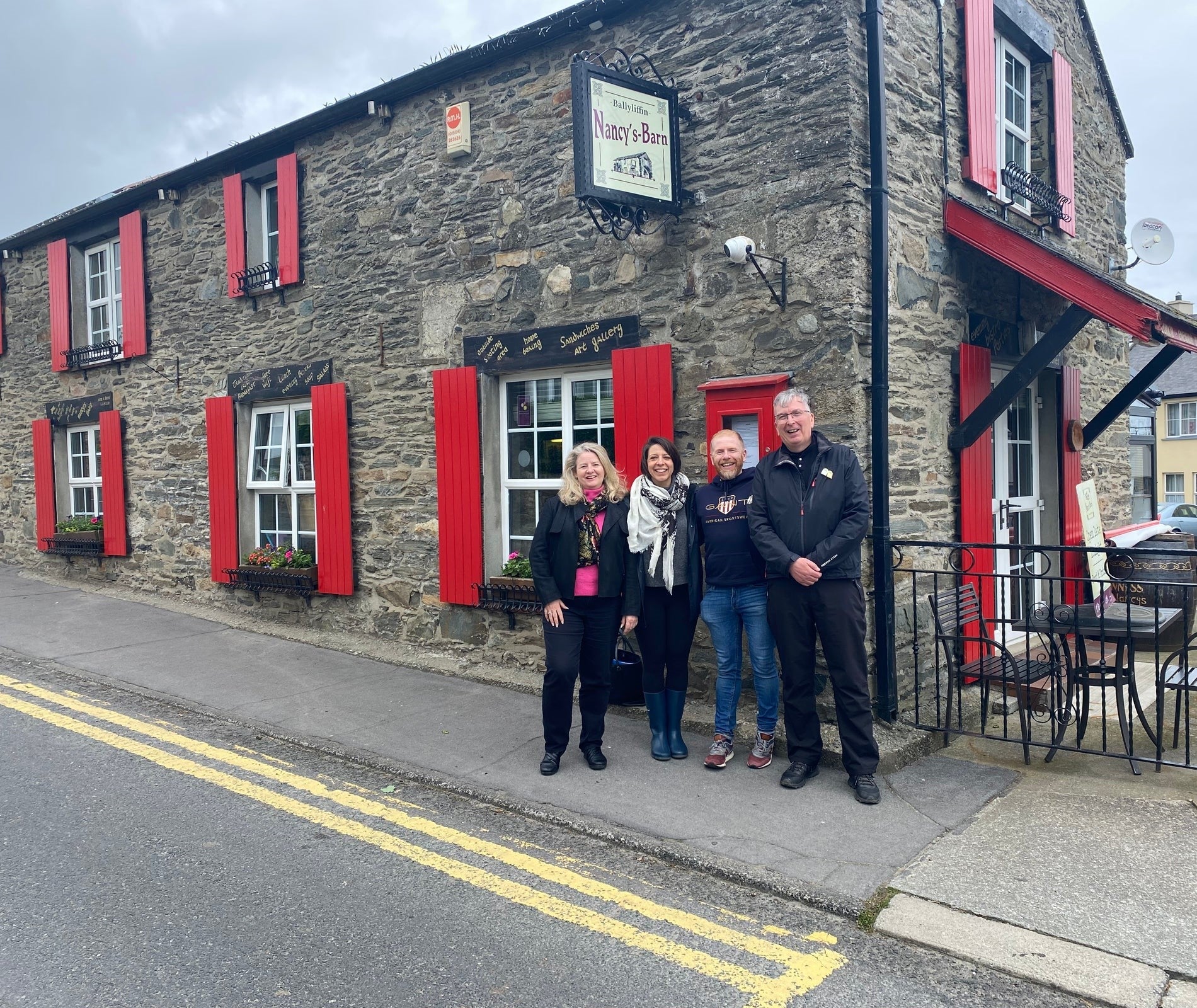 People standing outside Nancy's Barn pub in Ballyliffin County Donegal