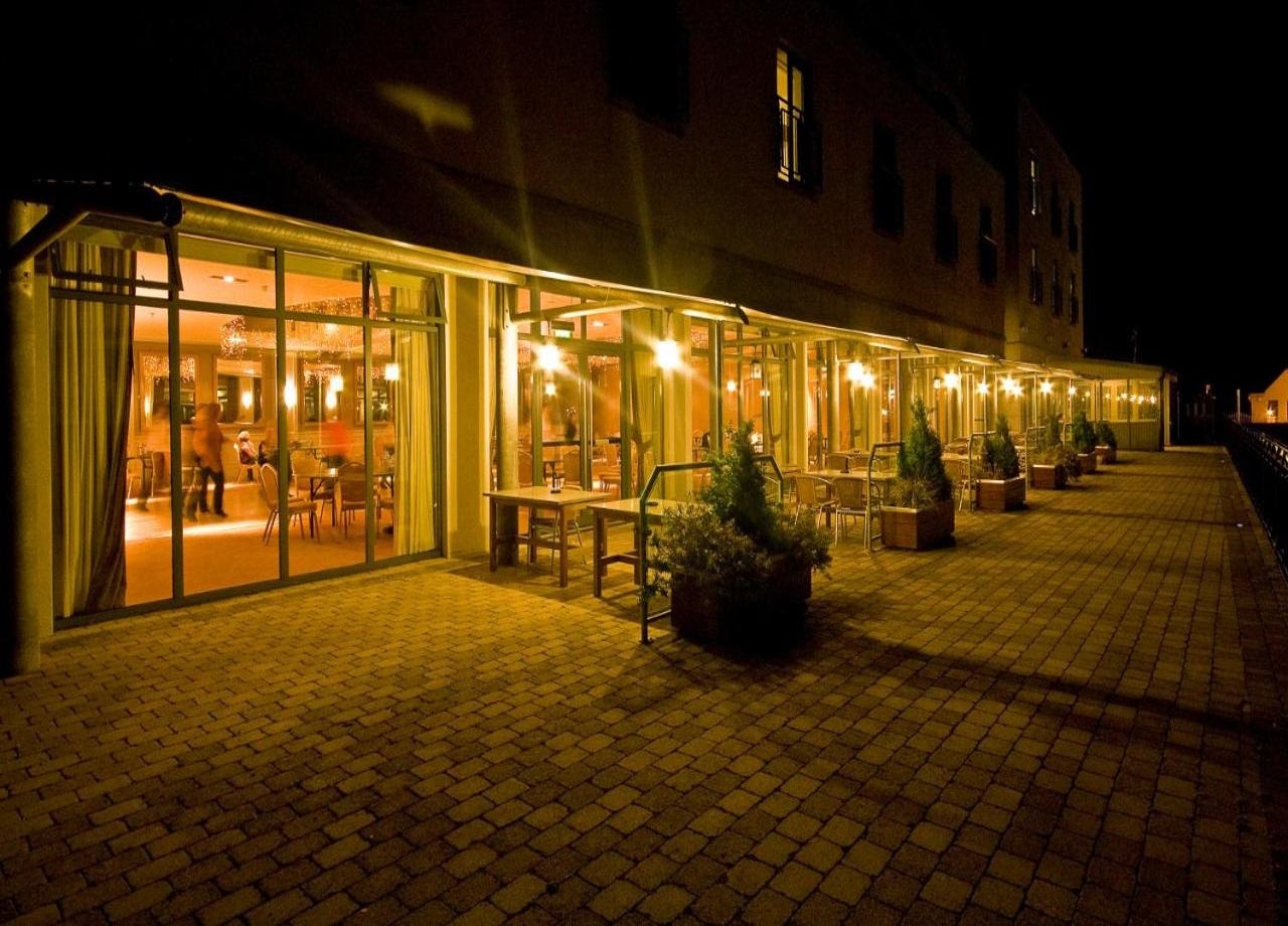 Night image of the patio area.