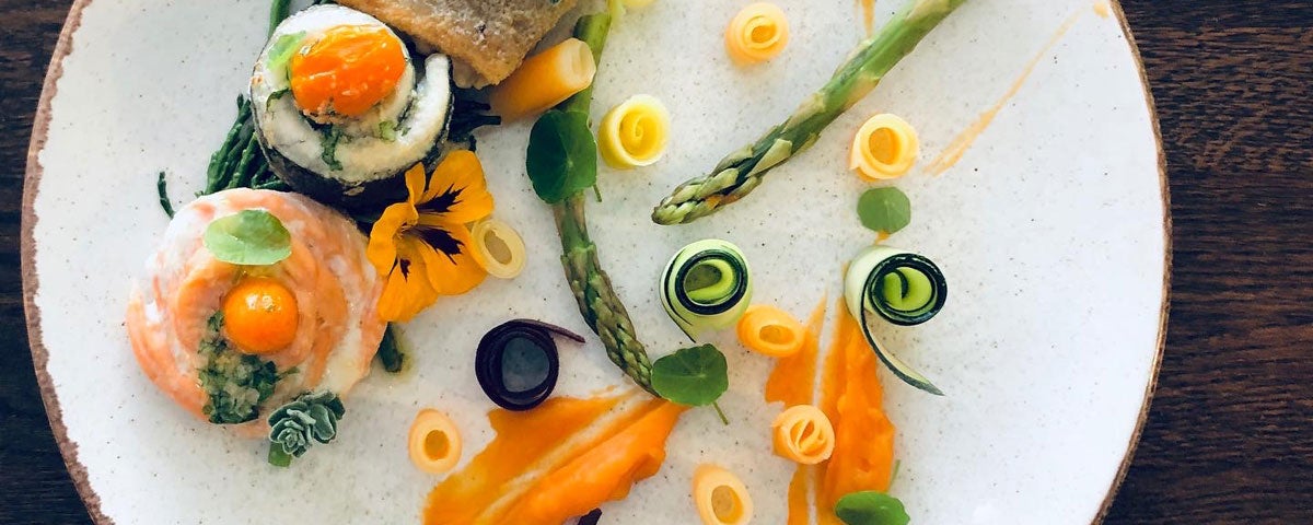 A tasty plate of seafood and sushi rolls