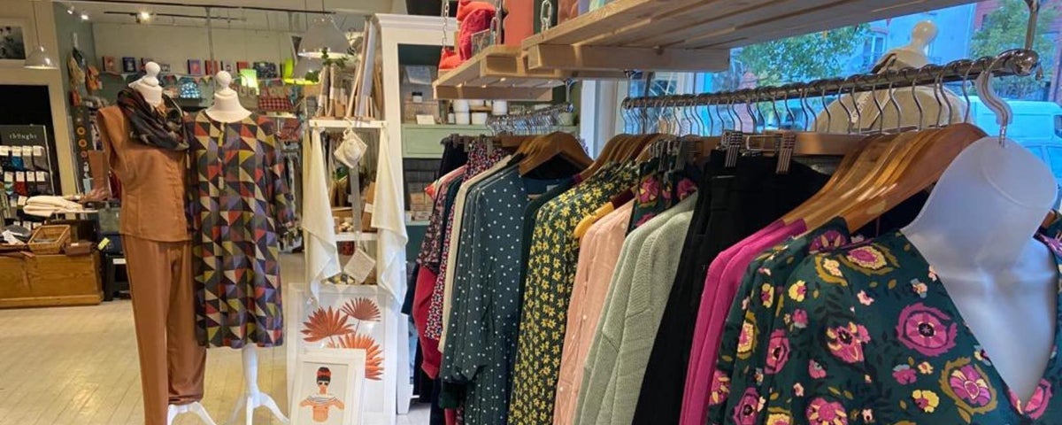 A selection of womens clothing on a rack