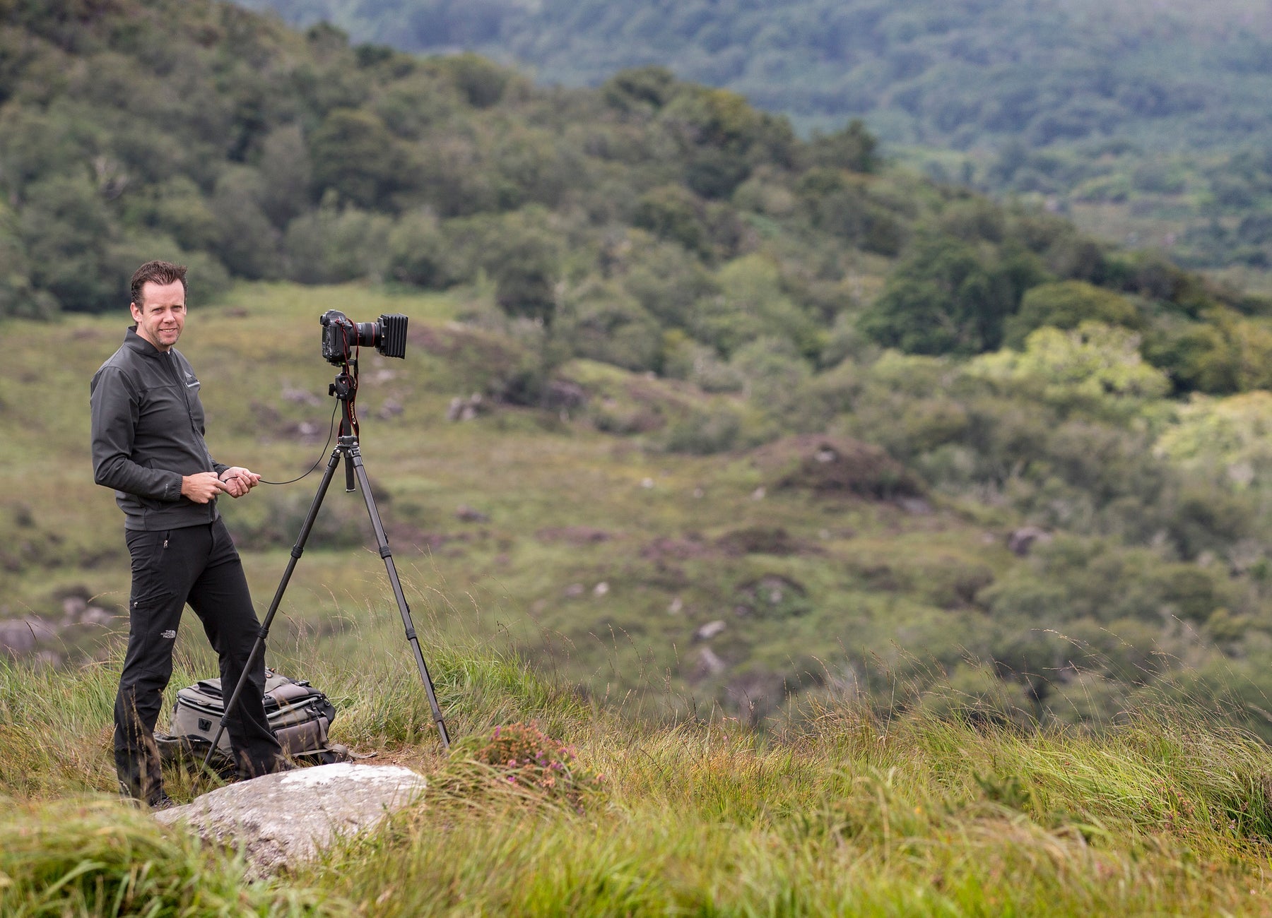 Photographer Norman McCloskey and his camera set up in the Kerry countryside