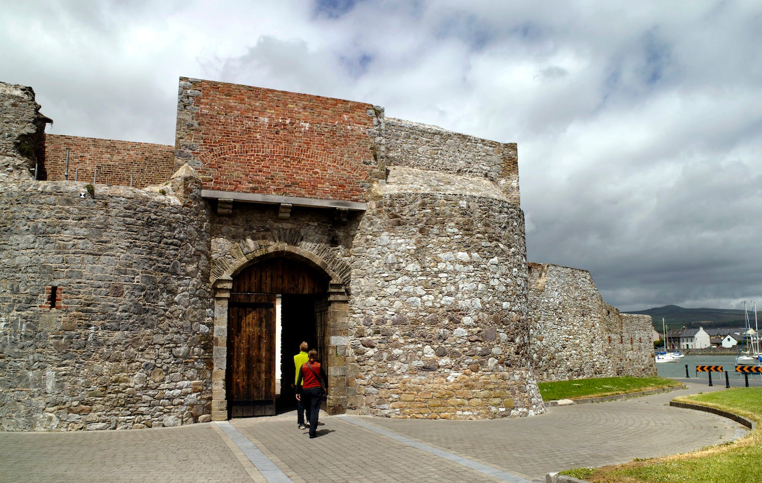 Two people visiting Dungarvan Castle in County Waterford.