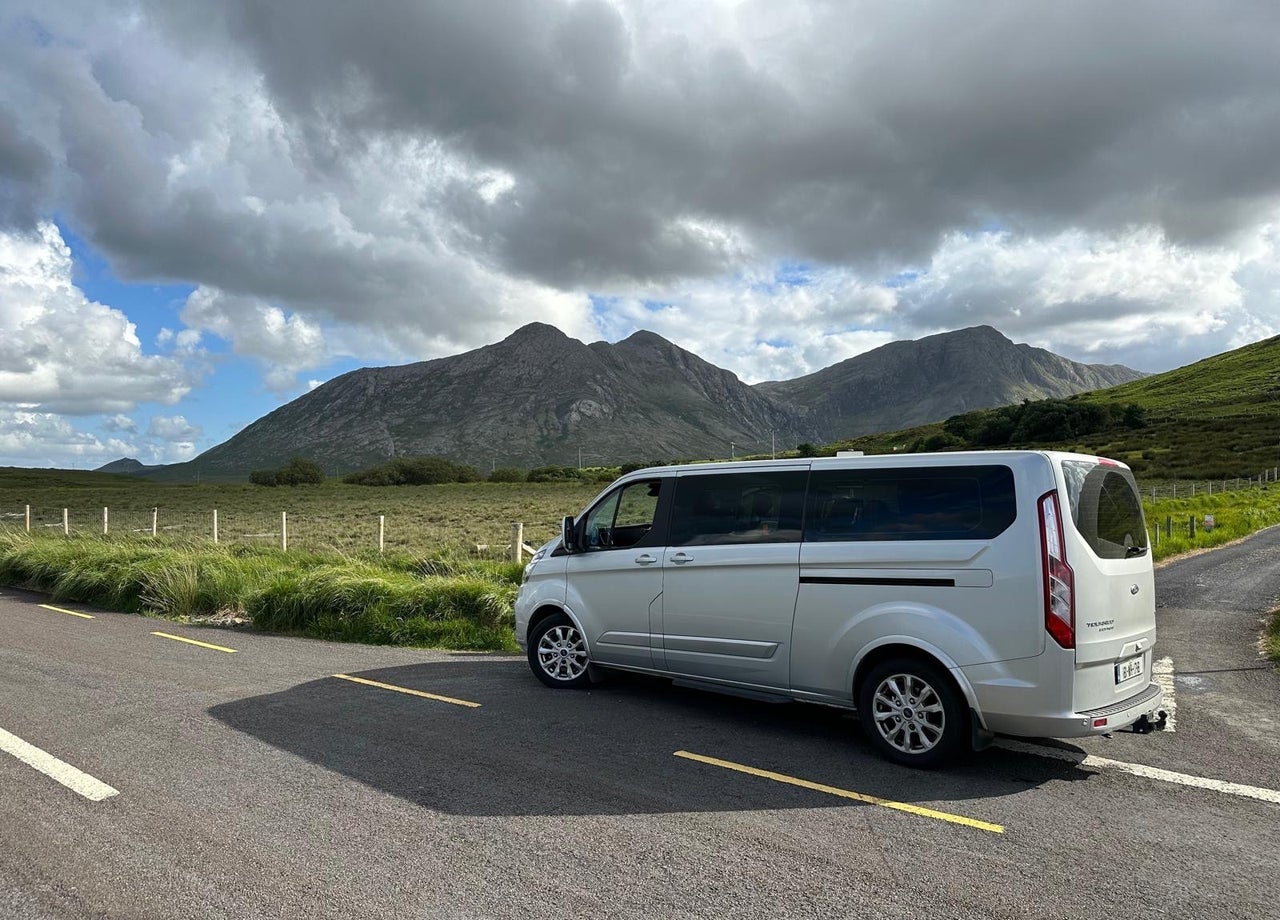 Tour bus with mountain in the background