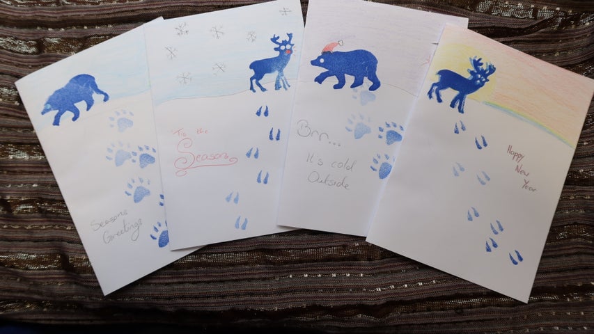 Footprints in the snow greeting cards