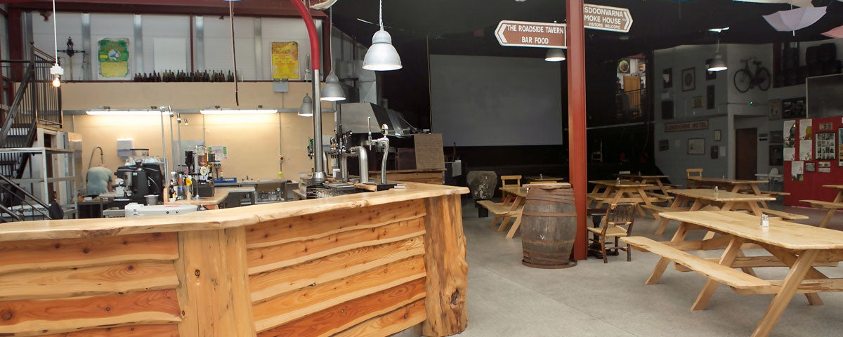 Interior view of bar with tables and benches