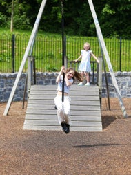 A girl enjoying the children's playground zipline at Ardgillan Castle and Gardens