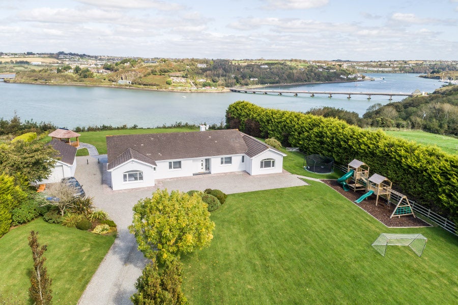 Front view of property over looking water