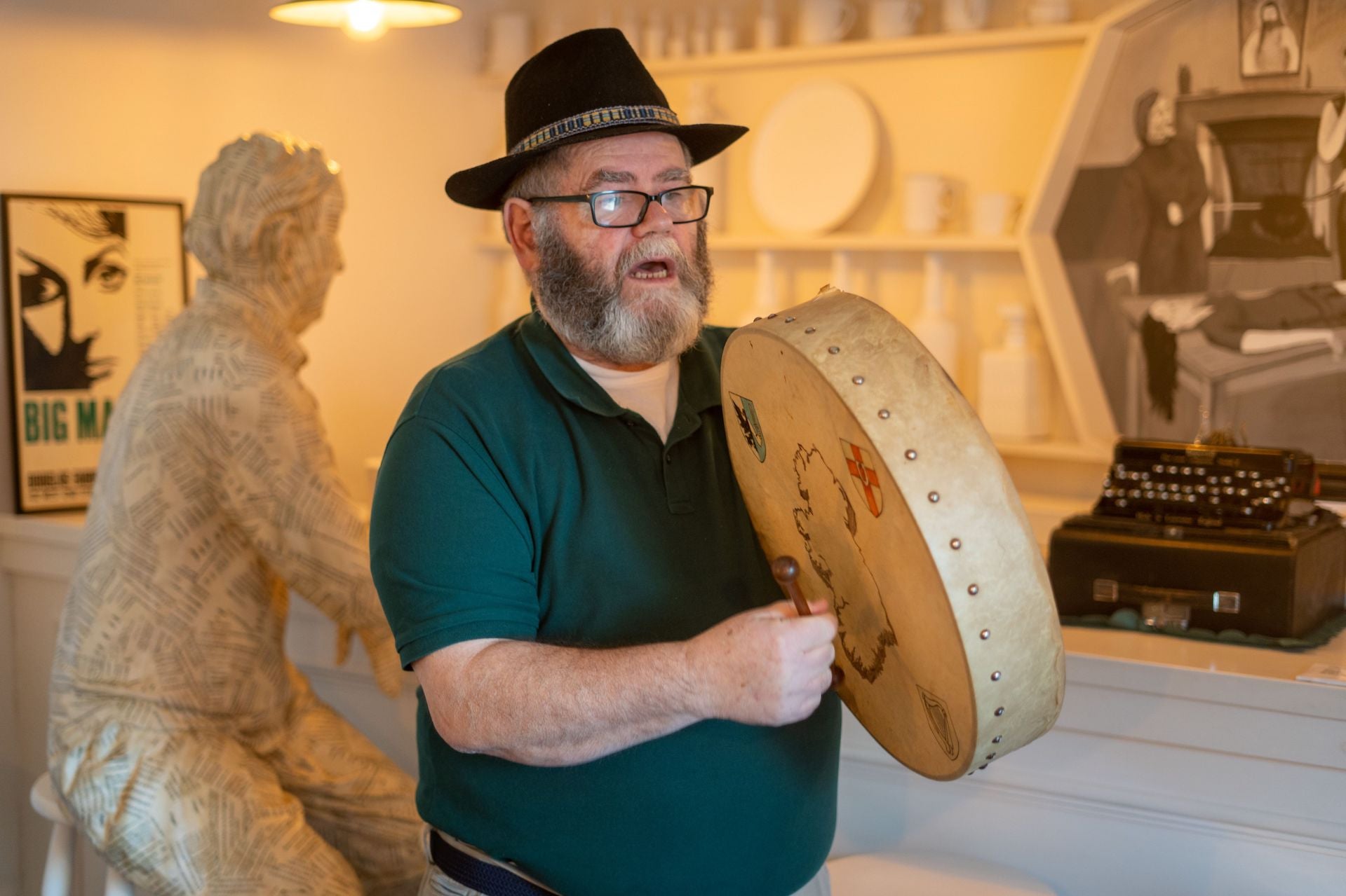 Vincent, performer guide at Kerry Writers' Musuem plays the bodhrán during a performance of 'Many Young Men of Twenty' by John B. Keane