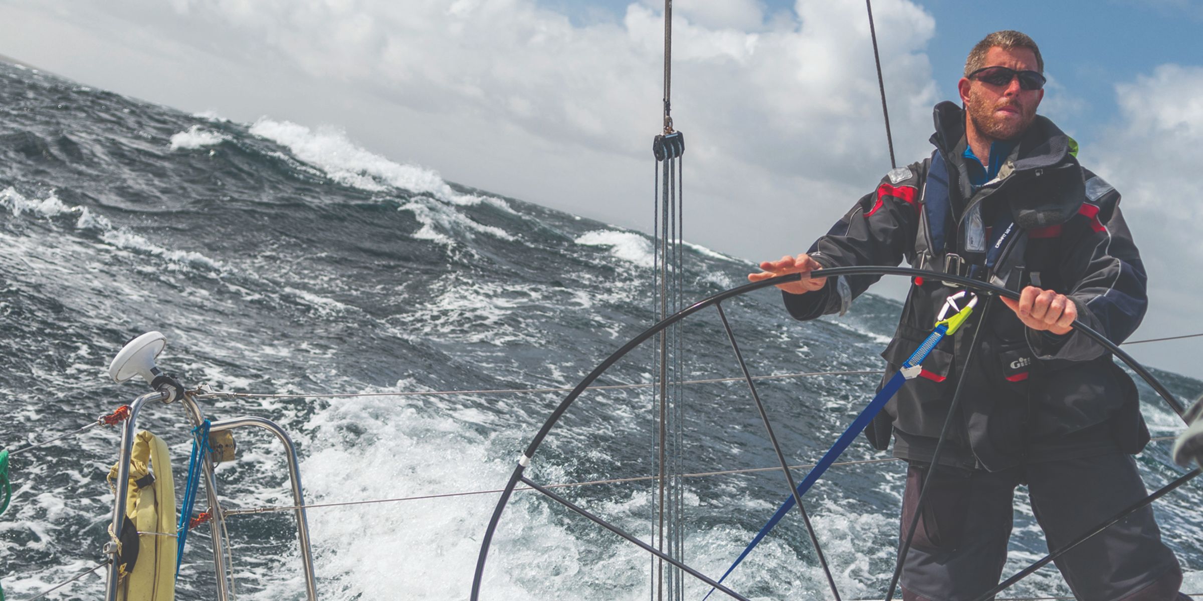 A man driving a boat in County Sligo