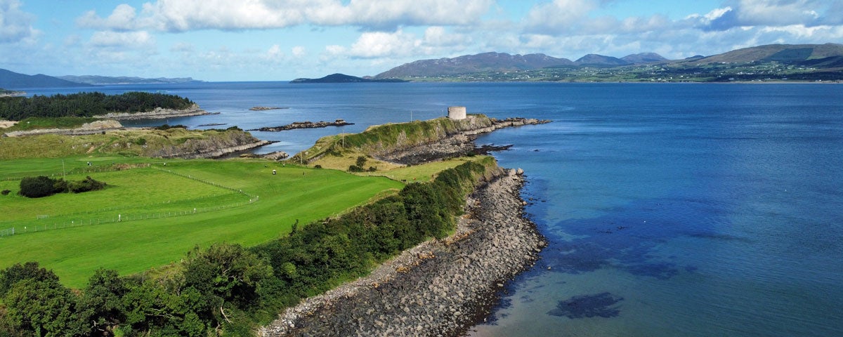 A view of the headland near the ninth hole with Macamish Fort in the distance