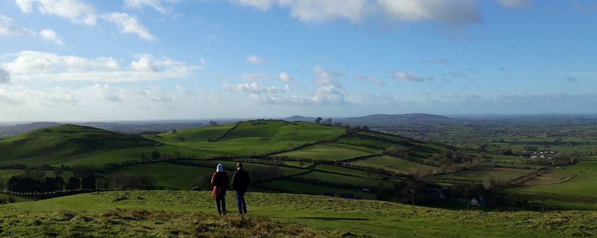 Two people enjoying the countryside views