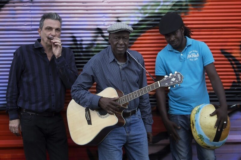3 men with musical instruments