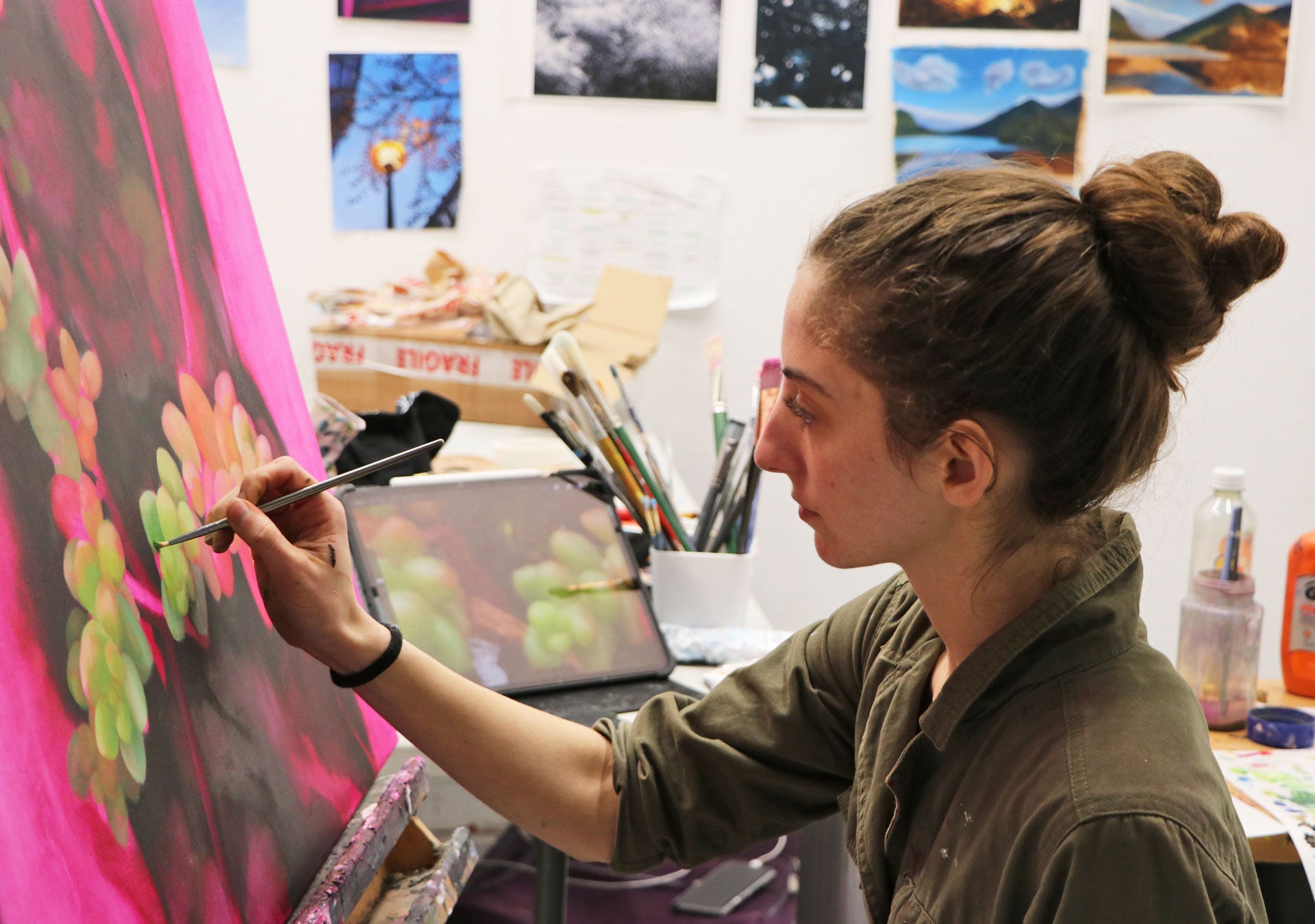 Burren College of Art showing an artist painting a colourful canvas