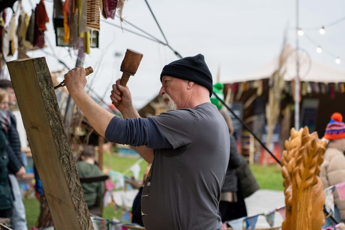 A woodturner at the 2024 Púca Festival in Trim, Co Meath