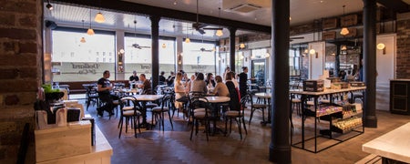 People dining in the Dollard Market