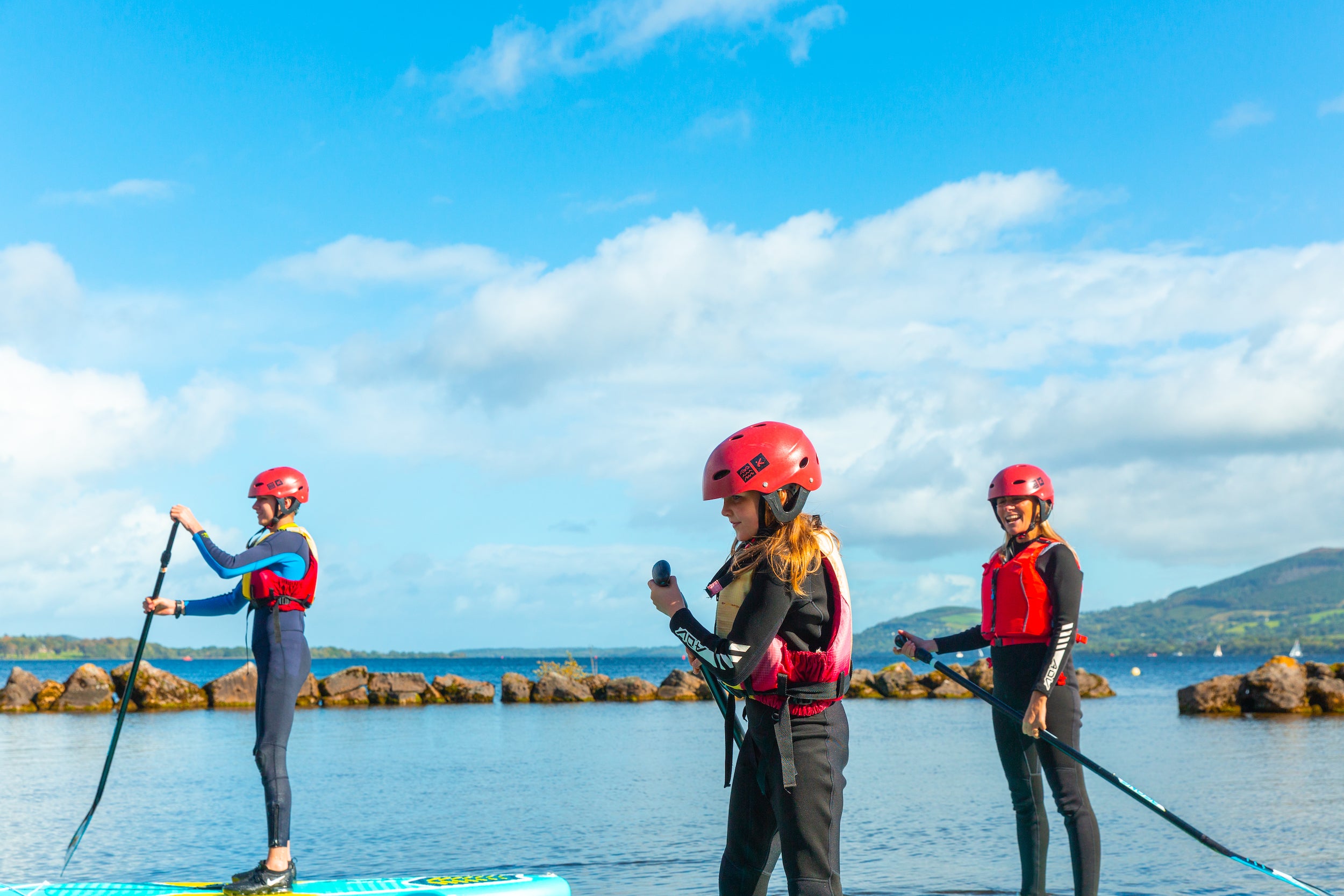 A family SUPing at UL Sports Adventure Centre in Killaloe, Co Clare