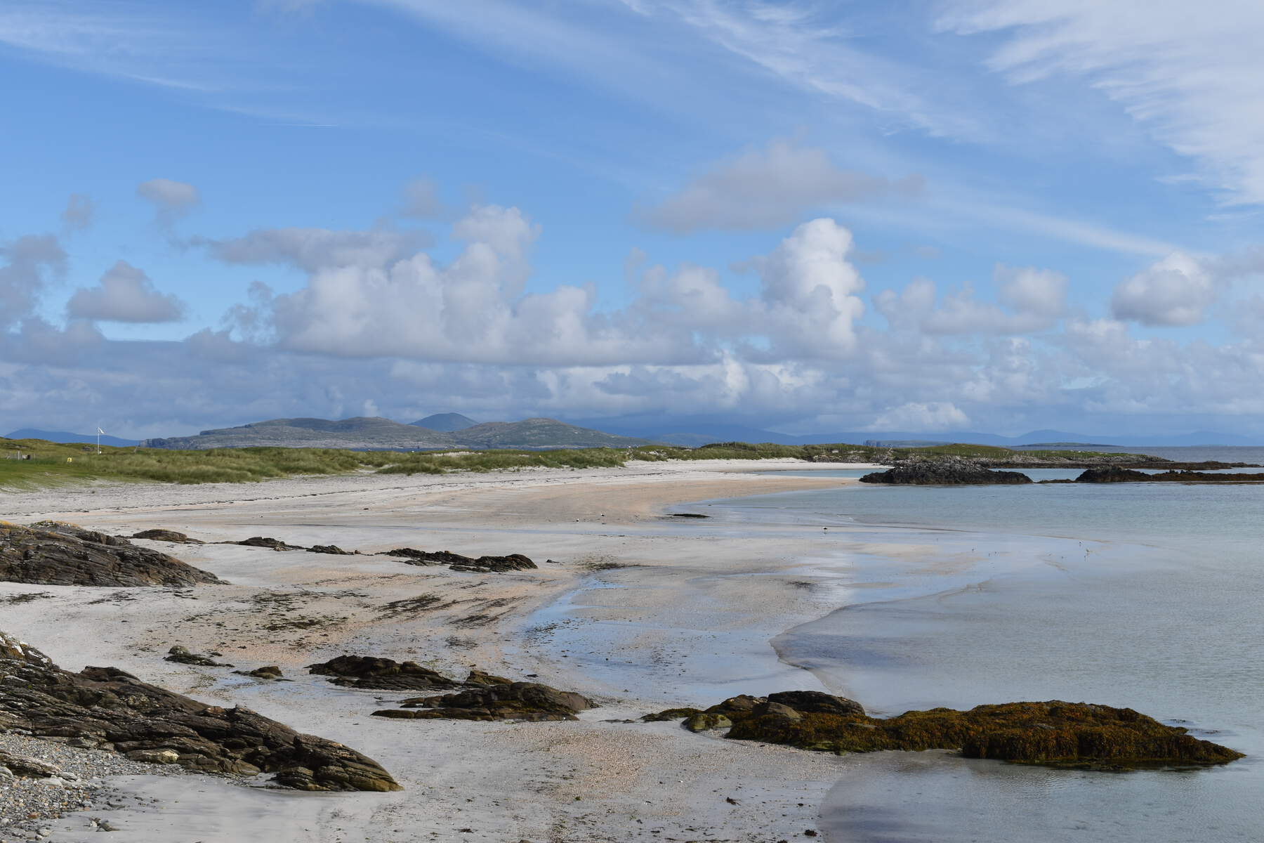 Seaside with blue sky and white clouds