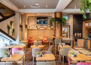 Seating area with tables and chairs