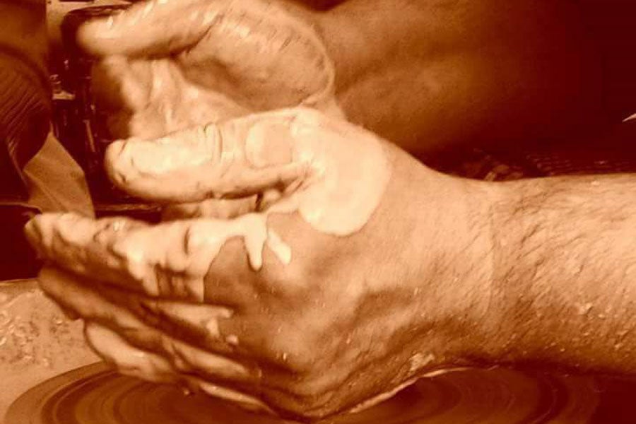 Hands of a potter at Busy Bees Ceramics Glaslough County Monaghan