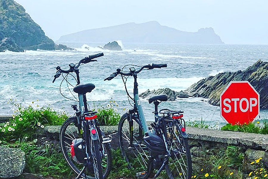 Dingle Electric Bike Experience view of crashing ocean waves and mountains
