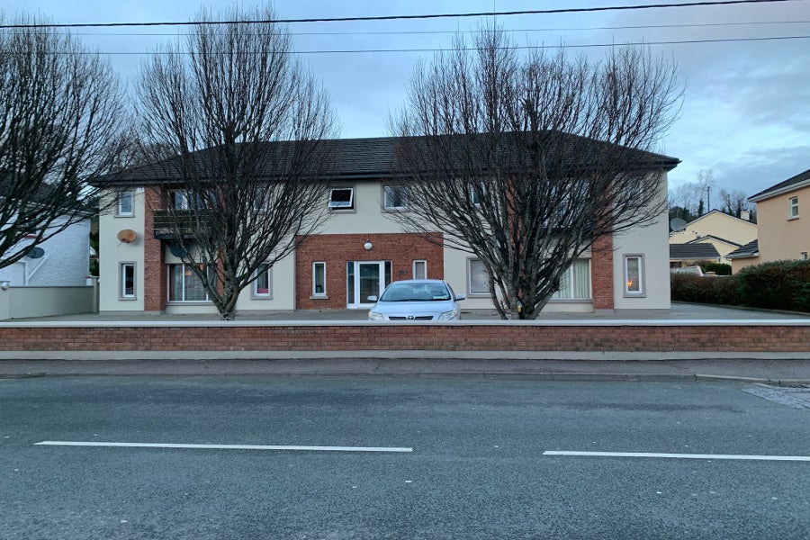 Exterior of apartment with private parking