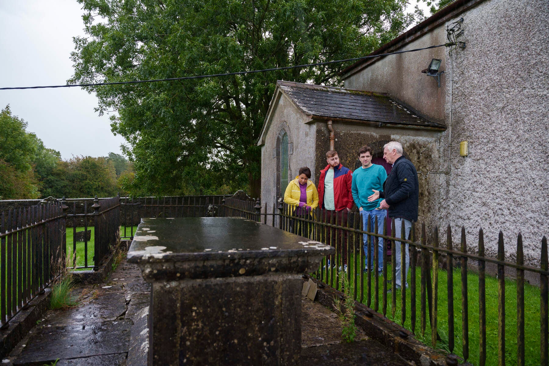 Group learning about history at a famous grave site.
