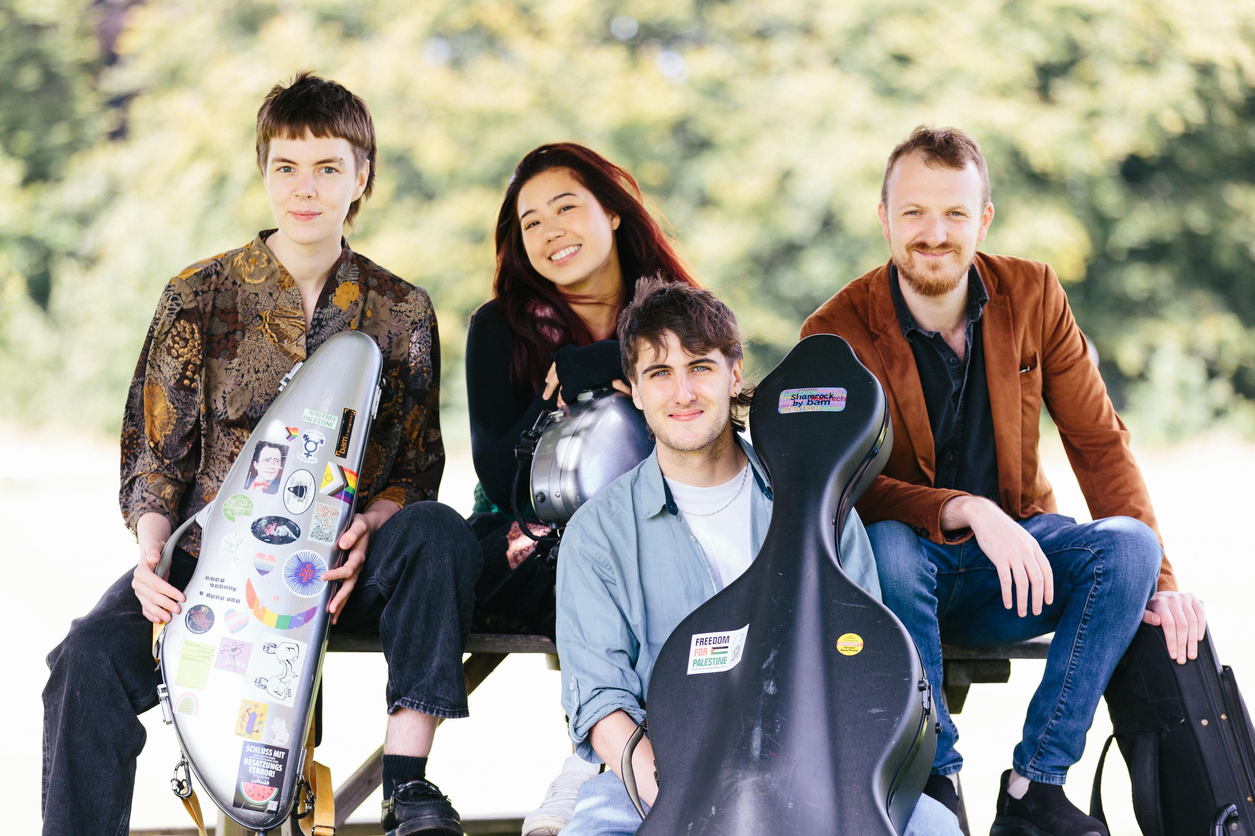 The members of the Raja Quartet.