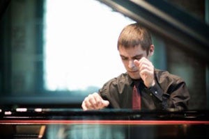 A gentleman playing the piano
