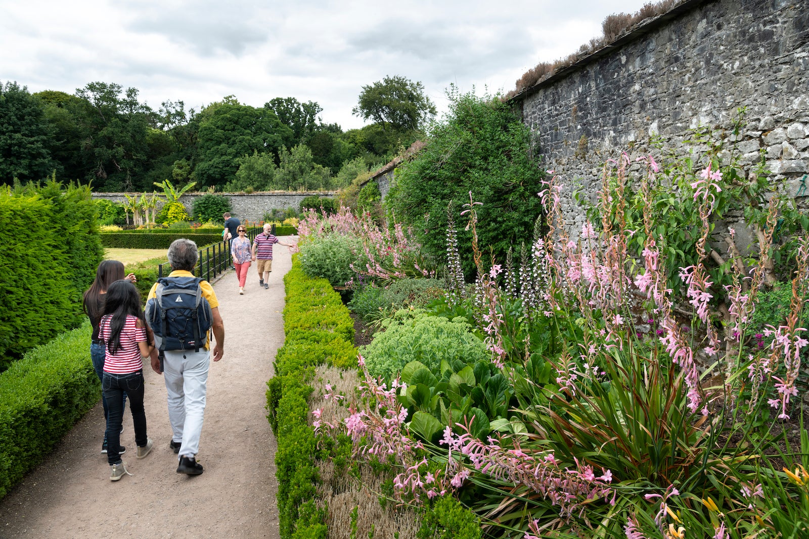 People walking in the Fota House gardens in County Cork
