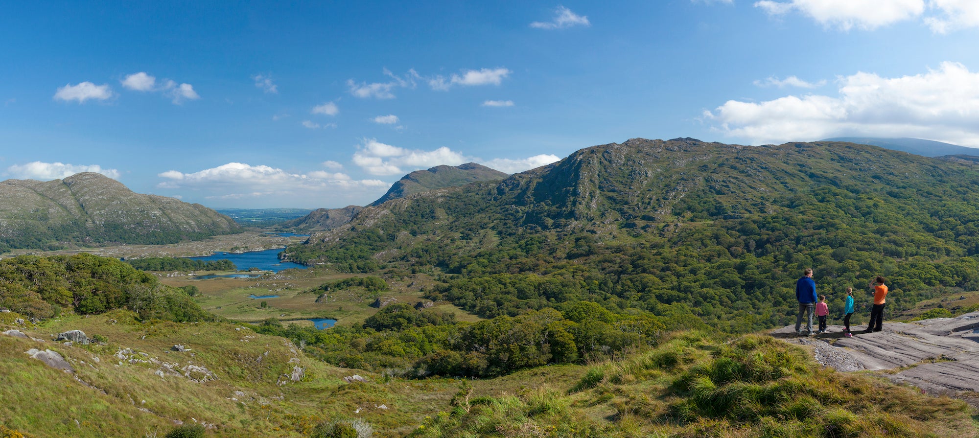 A family looking out at Ladies View in County Kerry