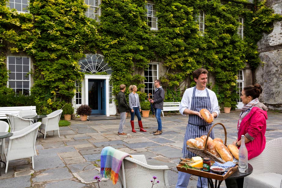 People standing outside Ballymaloe House in Cork