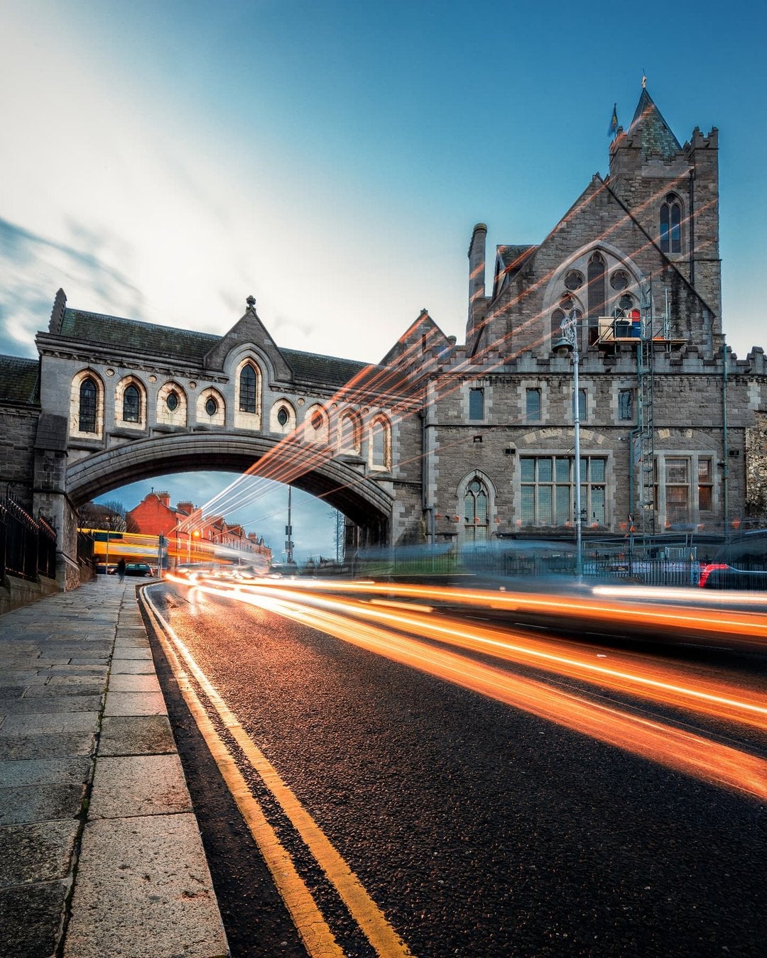 Image the exterior of Dublinia and streaming lights along a road.