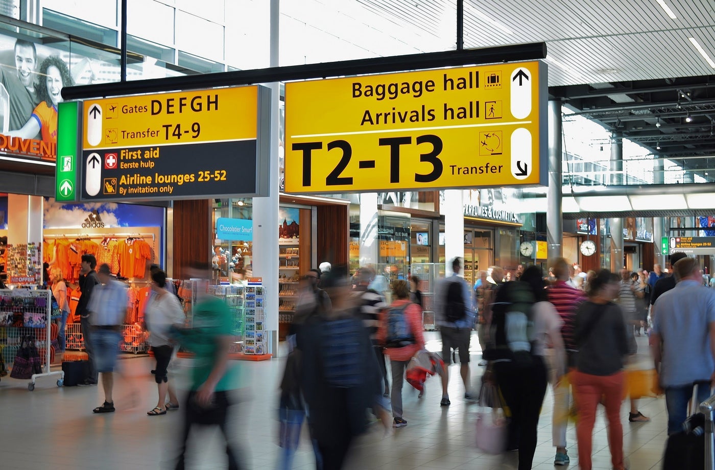 Lots of people in an airport terminal