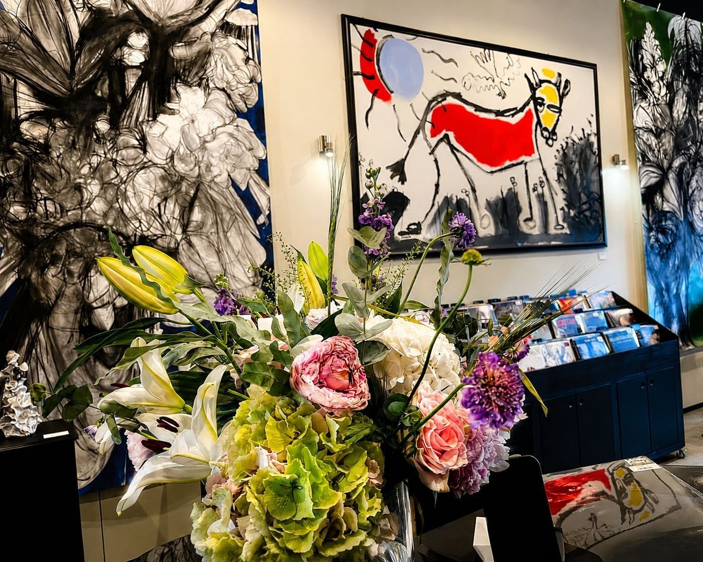 Abstract painting of a horse and a vase of flowers at The Kilmorna Collection