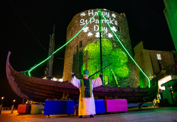 Saint Patrick in front of Reginalds Tower in Waterford City