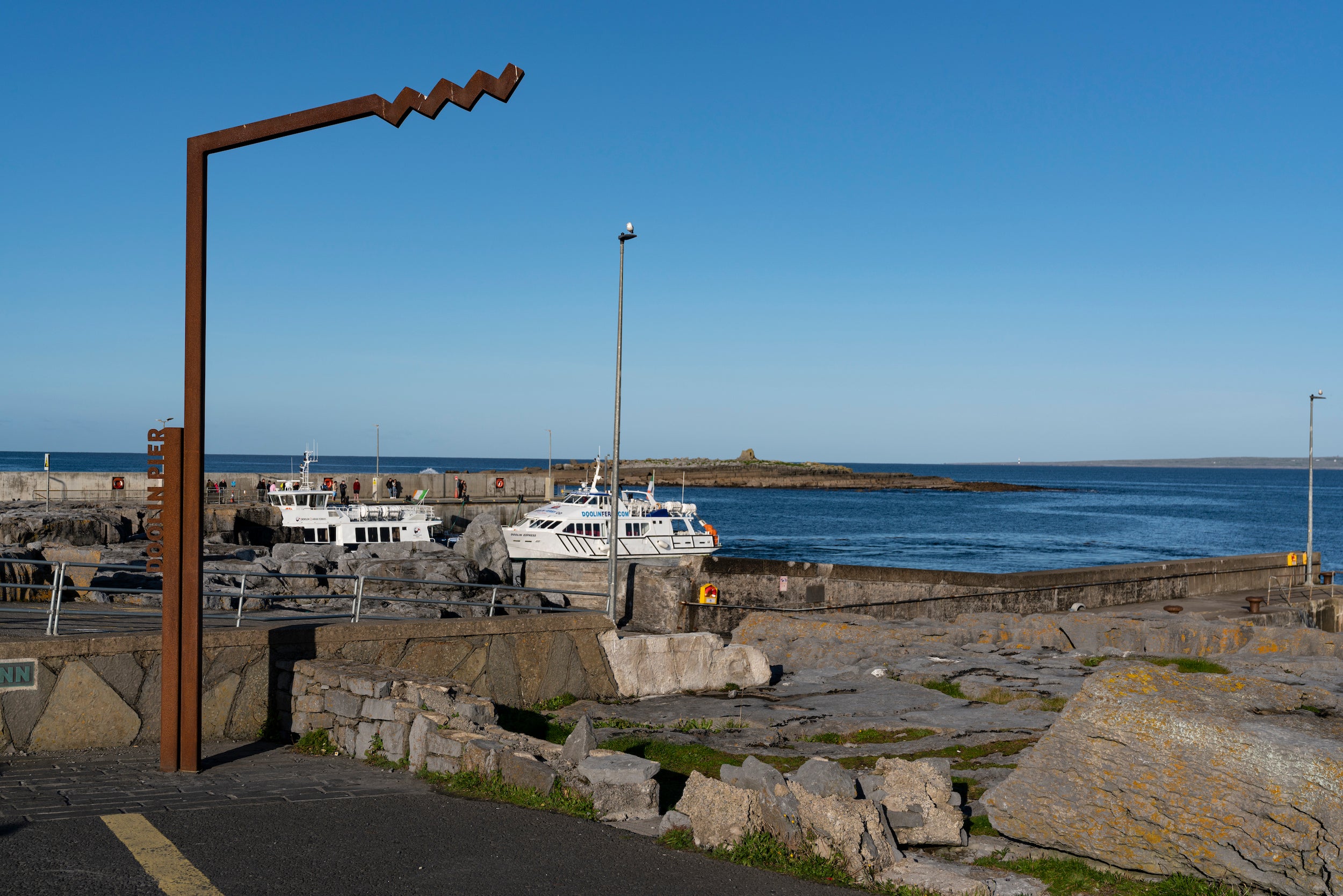 Boats docked at Doolin Pier in County Clare